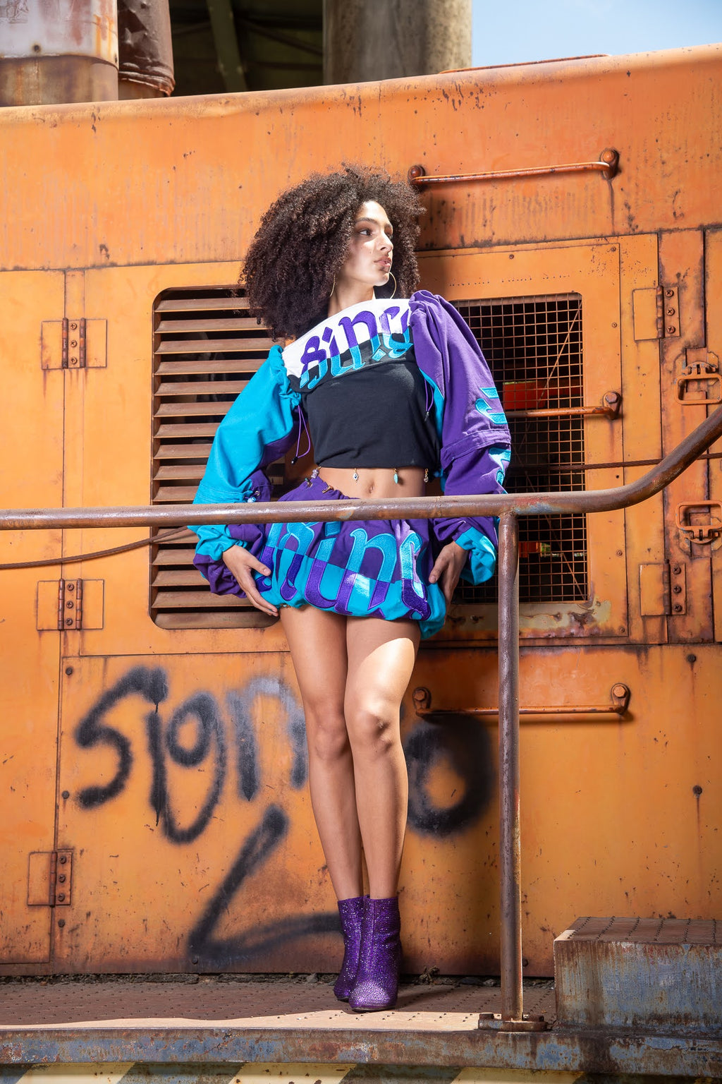 SI’NU LEG / ARM SLEEVES W/ LOGO (turquoise/purple)